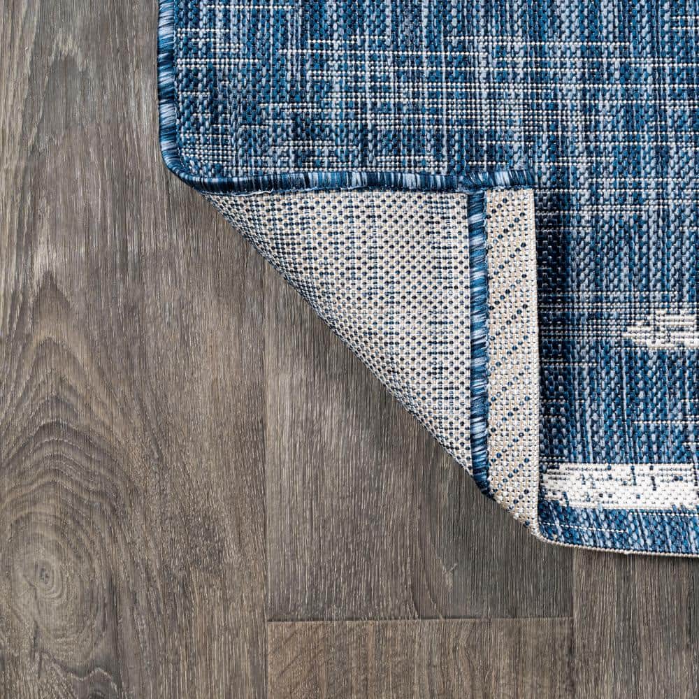 Bohemian Stripe Blue and Ivory Synthetic Area Rug 5' x 8'
