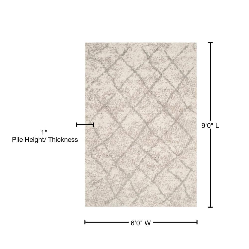 6' x 9' Gray and Cream Shag Area Rug