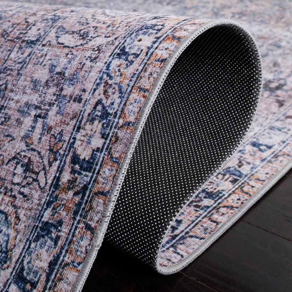 Easy-Care Washable Blue Synthetic 6' x 9' Non-Slip Rug