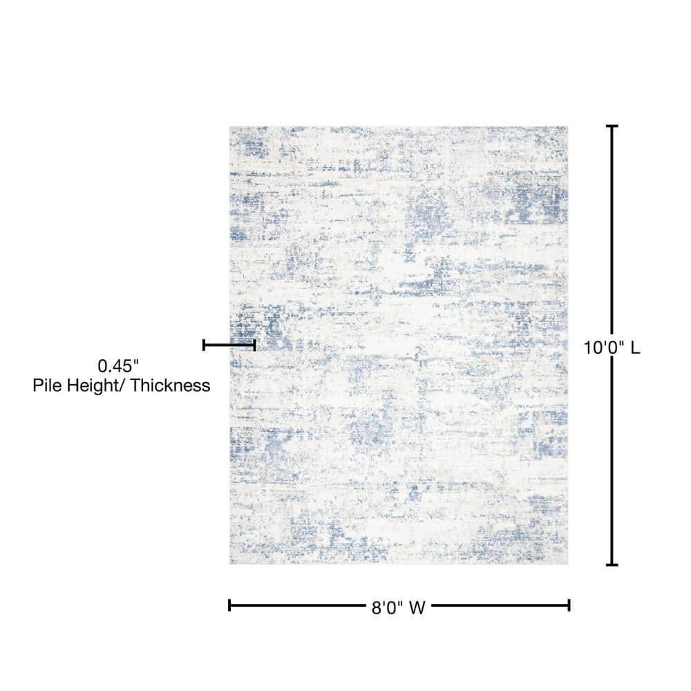 Ivory and Blue Abstract 8' x 10' Synthetic Area Rug