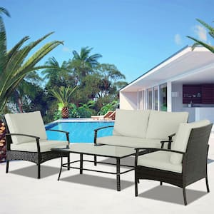4-Piece Brown Wicker Outdoor Conversation Set with Large Table and Beige Cushions