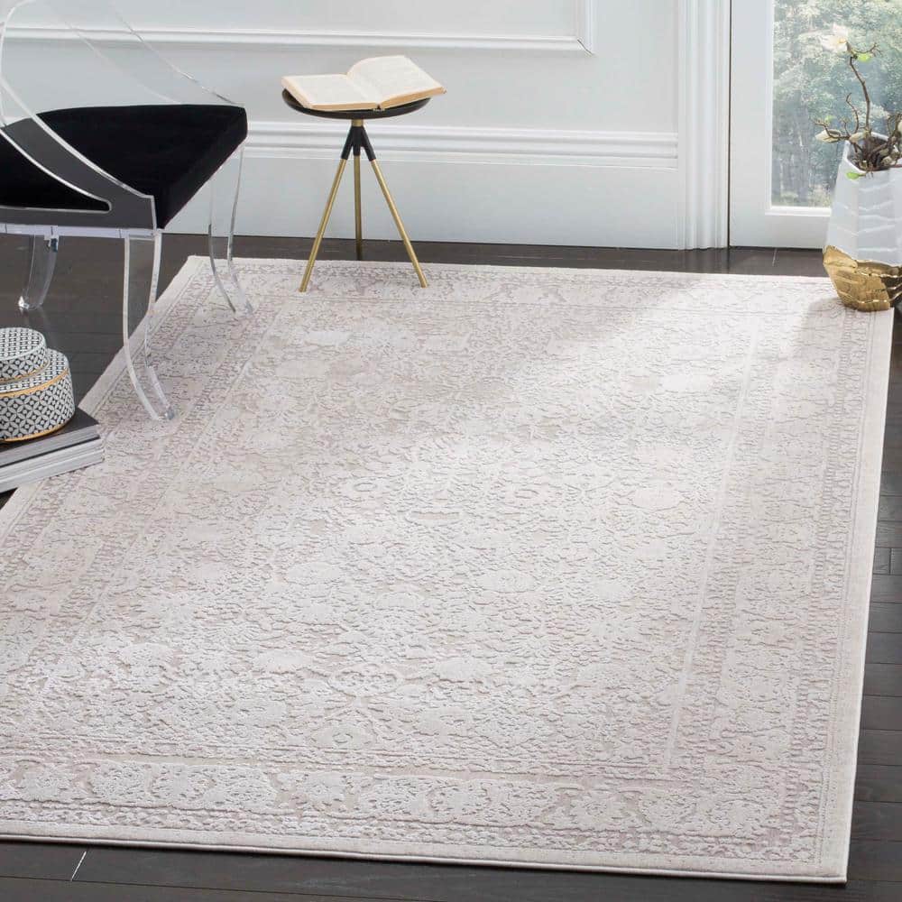 Beige and Cream Floral 10' x 14' Synthetic Area Rug