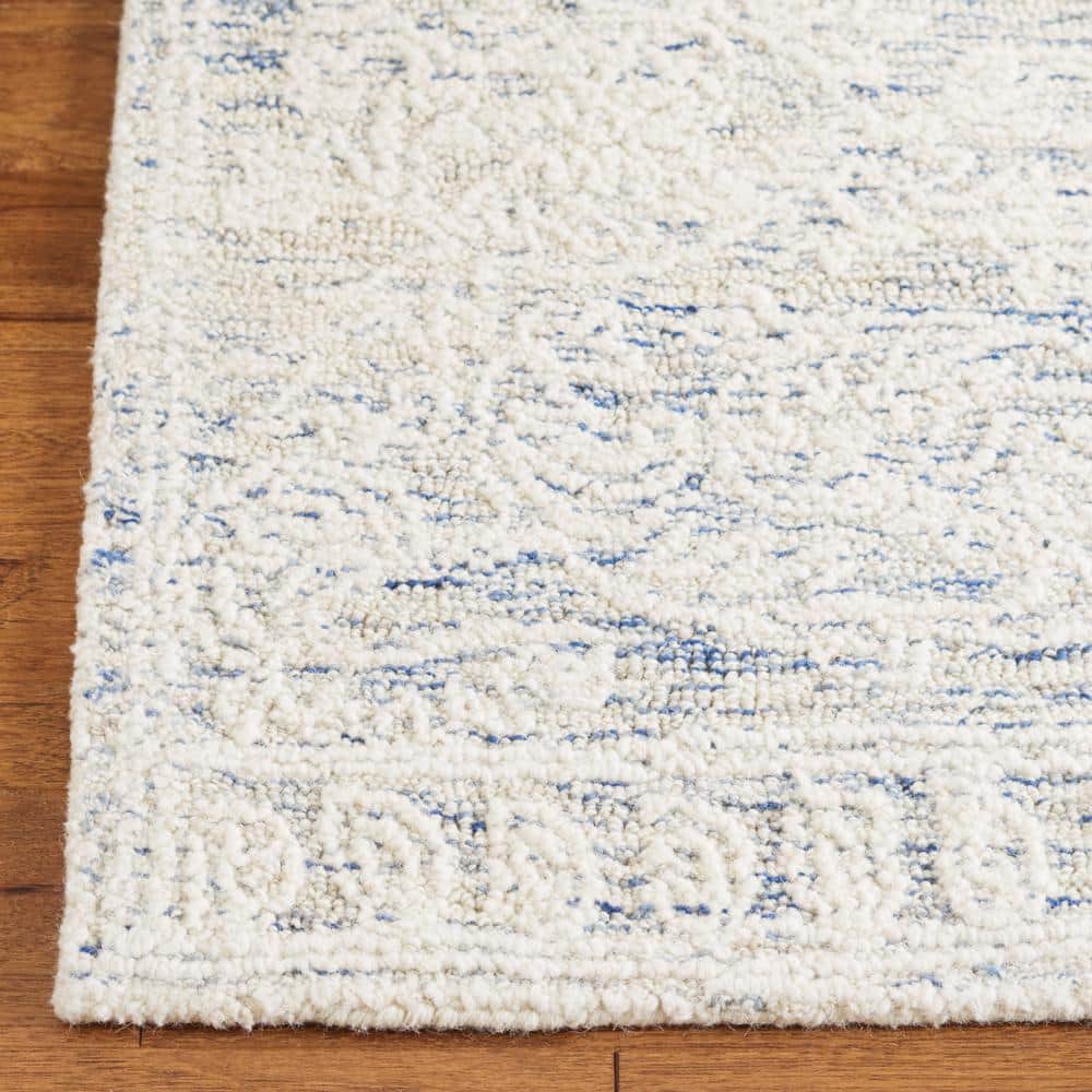 Ivory Round Handmade Tufted Wool Abstract Rug, 4' x 6'
