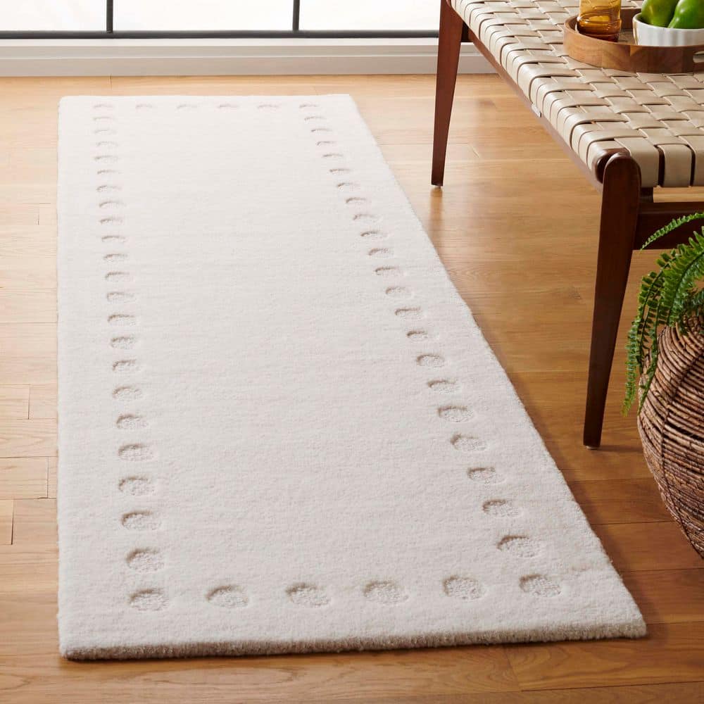 Metro 2 ft. x 7 ft. Ivory Dotted Border Runner Rug price history on PriceWatchPro