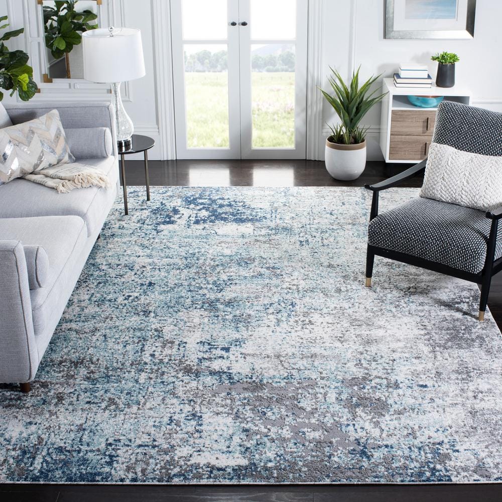 Gray and Light Blue Abstract 8' x 10' Synthetic Area Rug