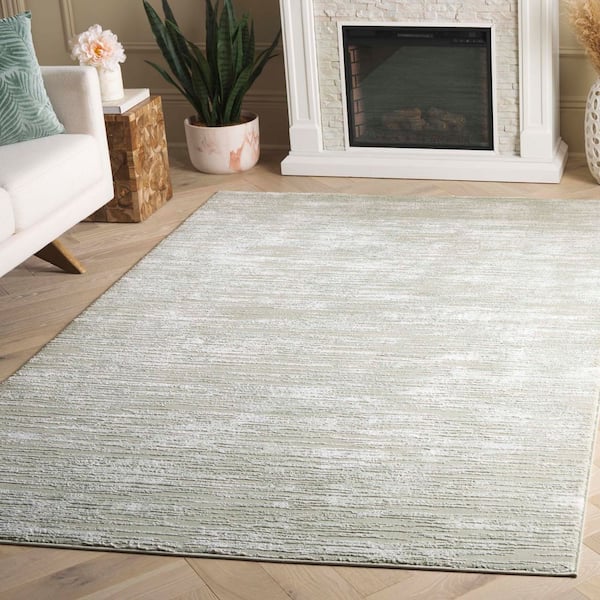 Revive 7 ft. x 9 ft. Sage/Ivory Solid Distressed Area Rug