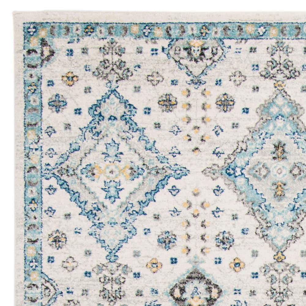 Ivory and Light Blue Floral Synthetic 9' x 12' Rectangular Area Rug