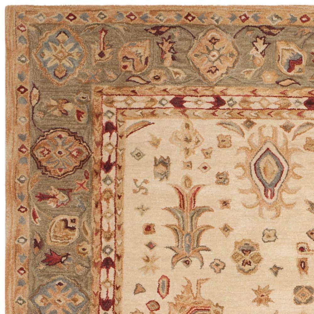 Ivory and Green Handmade Wool Tufted 8' x 10' Area Rug