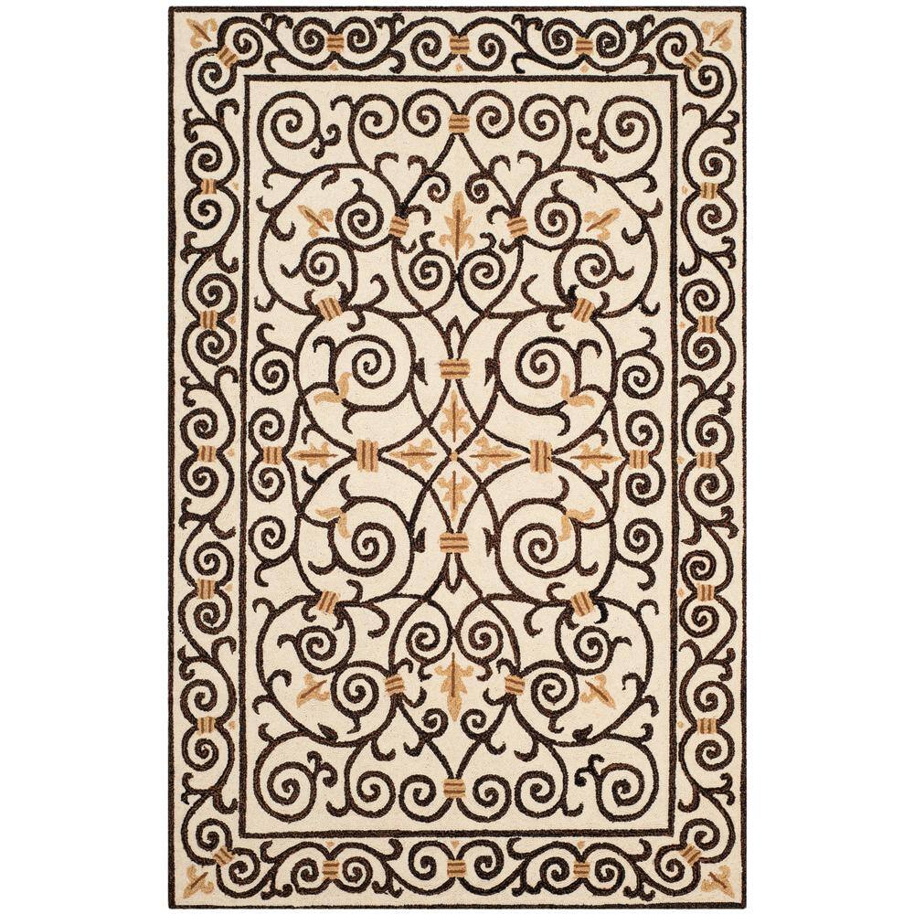 SAFAVIEH Chelsea Ivory/Dark Brown 6 ft. x 9 ft. Border Area Rug 100% pure virgin wool pile, hand-hooked to a durable cotton backing. American Country and turn-of-the-century European designs. This collection is handmade in China exclusively for Safavieh. This is a great addition to your home whether in the country side or busy city. Color: Ivory/Dark Brown.