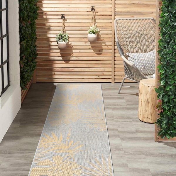 https://images.thdstatic.com/productImages/c9db8317-8e68-46bc-80cd-14ce859cdb62/svn/yellow-world-rug-gallery-outdoor-rugs-5007yellow2x7-c3_600.jpg