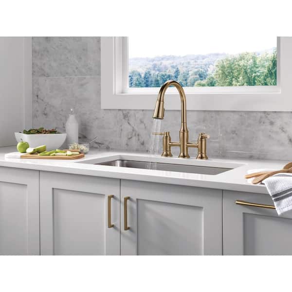 Delta Renaldi Gold Double Handle Bridge Kitchen Faucet in