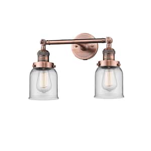 Bell 16 in. 2-Light Antique Copper Vanity Light with Clear Glass Shade