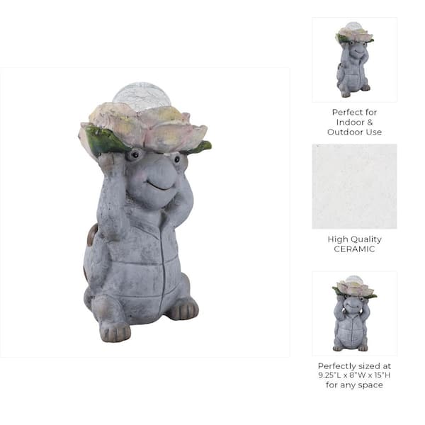 Liv & Skye Gray 15 in. Ceramic Turtle Holding Large Solar Flower