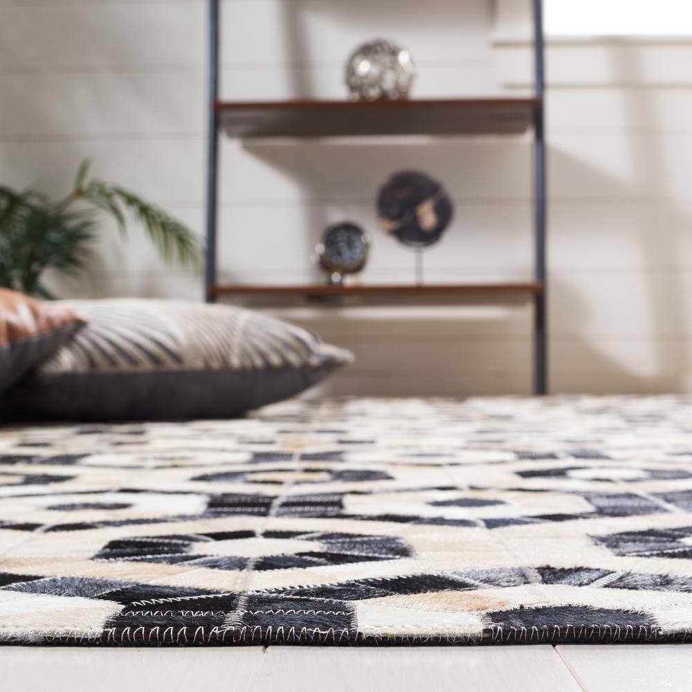 Handmade Black and Beige Geometric Cowhide Runner Rug