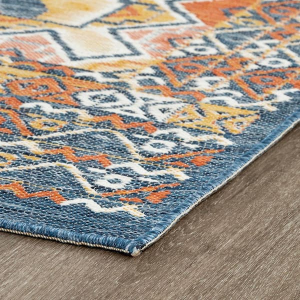 https://images.thdstatic.com/productImages/ca111e4b-81ce-5c27-8409-4ac3e60dc7cd/svn/multi-color-tayse-rugs-outdoor-rugs-flo1001-2x8-c3_600.jpg