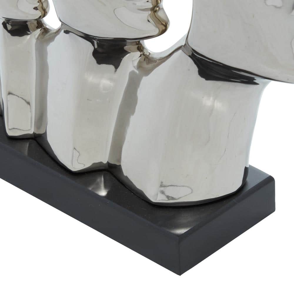Polished Silver Porcelain Abstract Face Statue 11" x 12"