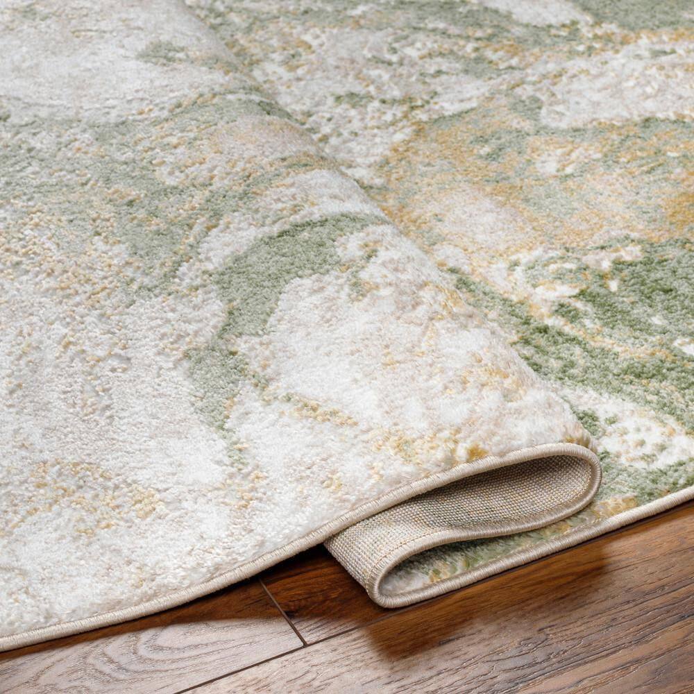 Ivory Spot 5' x 7' Reversible Washable Synthetic Rug