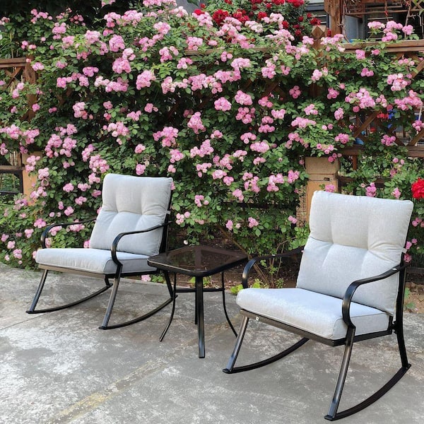 3-Piece Metal Outdoor Bistro Rocker Set with Off White Cushion and Teapoy