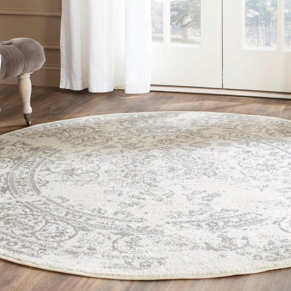 Chic Ivory & Silver 6' Round Synthetic Easy-Care Area Rug