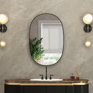 24 in. W x 36 in. H Oval Framed Wall Mount Bathroom Vanity Mirror in Matte Black