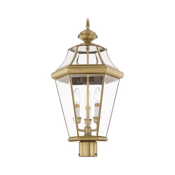 https://images.thdstatic.com/productImages/ca40b82b-f9b4-46b3-b98a-7f3e3a5143b6/svn/antique-brass-livex-lighting-post-lanterns-2364-01-4f_600.jpg