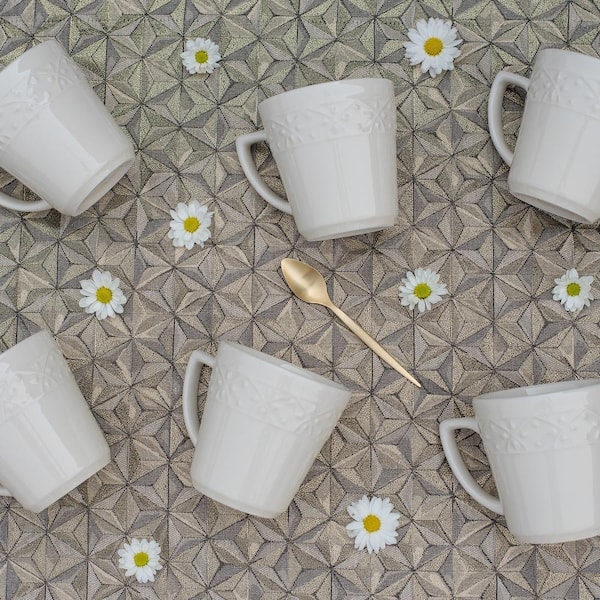 Mendi 12.17 oz. Ivory Earthenware Mugs (Set of 12)