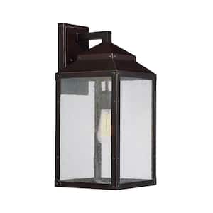 Brennan 8 in. W x 17.75 in. H 1-Light English Bronze/Gold Hardwired Outdoor Wall Lantern Sconce with Seeded Glass Shade
