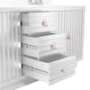 Close-up of the open drawers of a white bathroom vanity showing the drawer slides.