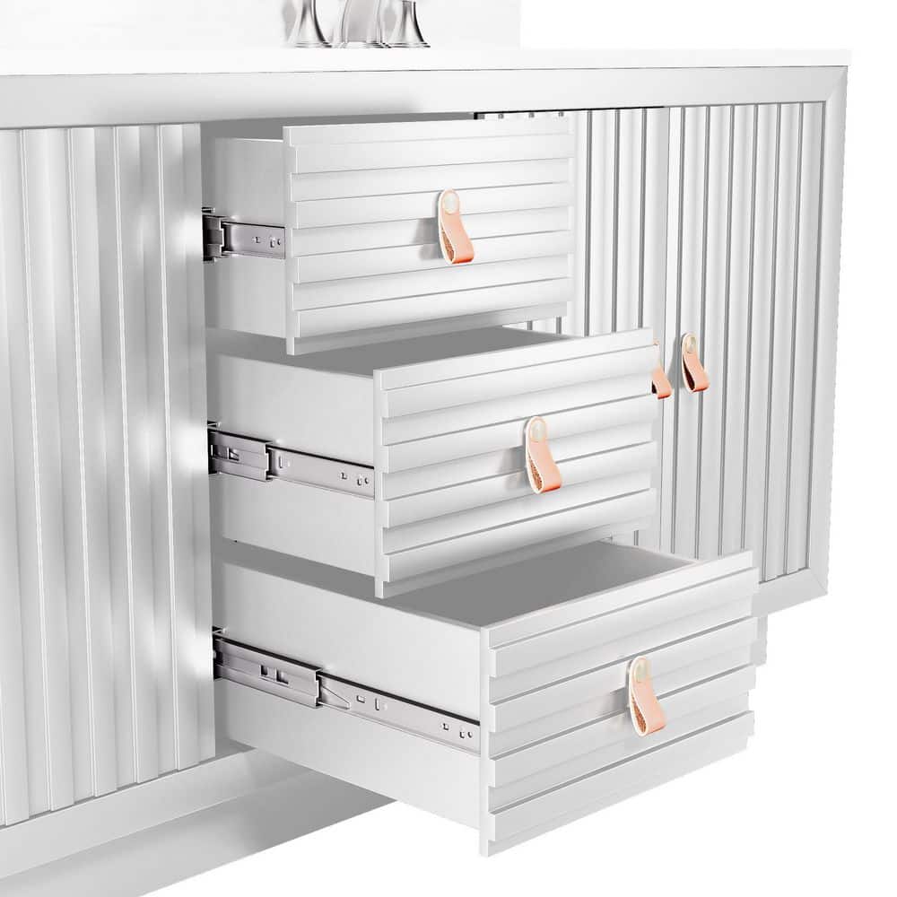 Close-up of the open drawers of a white bathroom vanity showing the drawer slides.