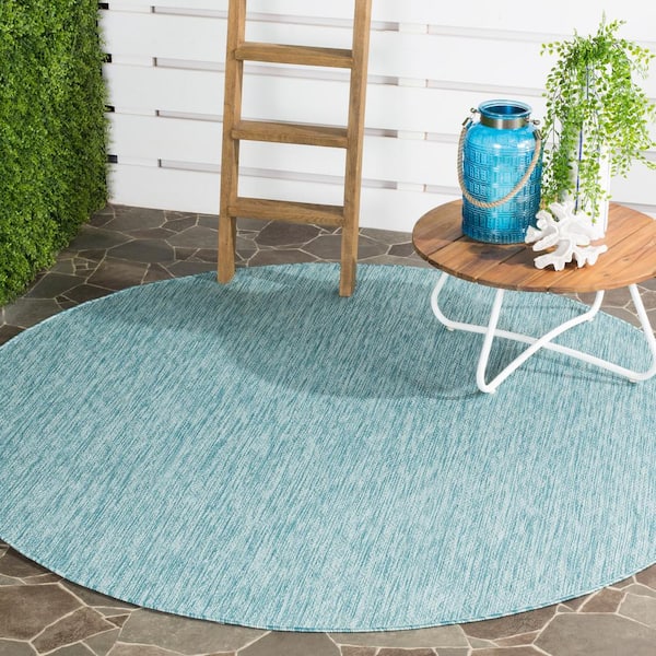 Courtyard Aqua 7 ft. x 7 ft. Round Solid Indoor/Outdoor Patio  Area Rug