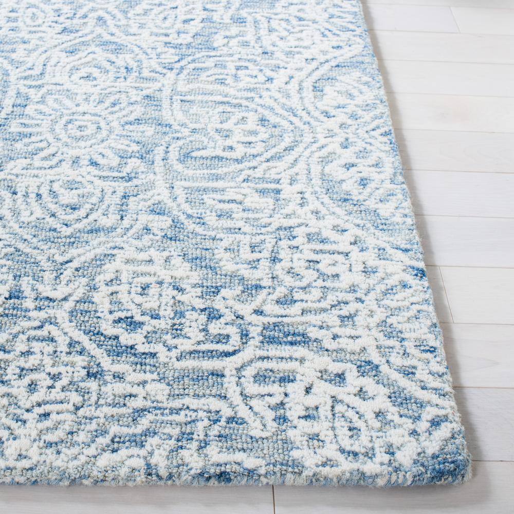Blue and Ivory Hand-Tufted Wool 8' x 10' Area Rug