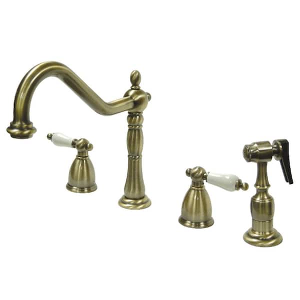 Kingston Brass Heritage 2-Handle Standard Kitchen Faucet with Side Sprayer in Antique Brass