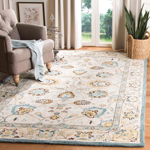 Antiquity 8 ft. x 10 ft. Peacock/Blue Border Floral Solid Color Area Rug