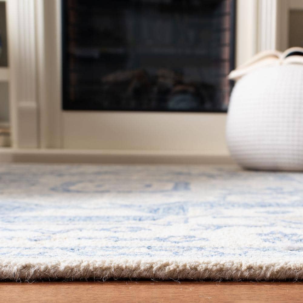 Ivory and Blue Handmade Wool Round Tufted Rug
