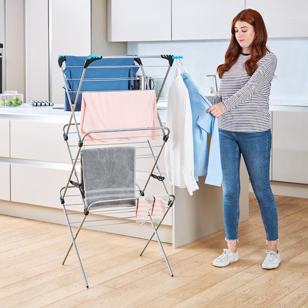 https://images.thdstatic.com/productImages/cabf632b-16bf-4209-a4f9-bffab9460e0b/svn/silver-minky-clothes-drying-racks-ih87400090v-4f_600.jpg