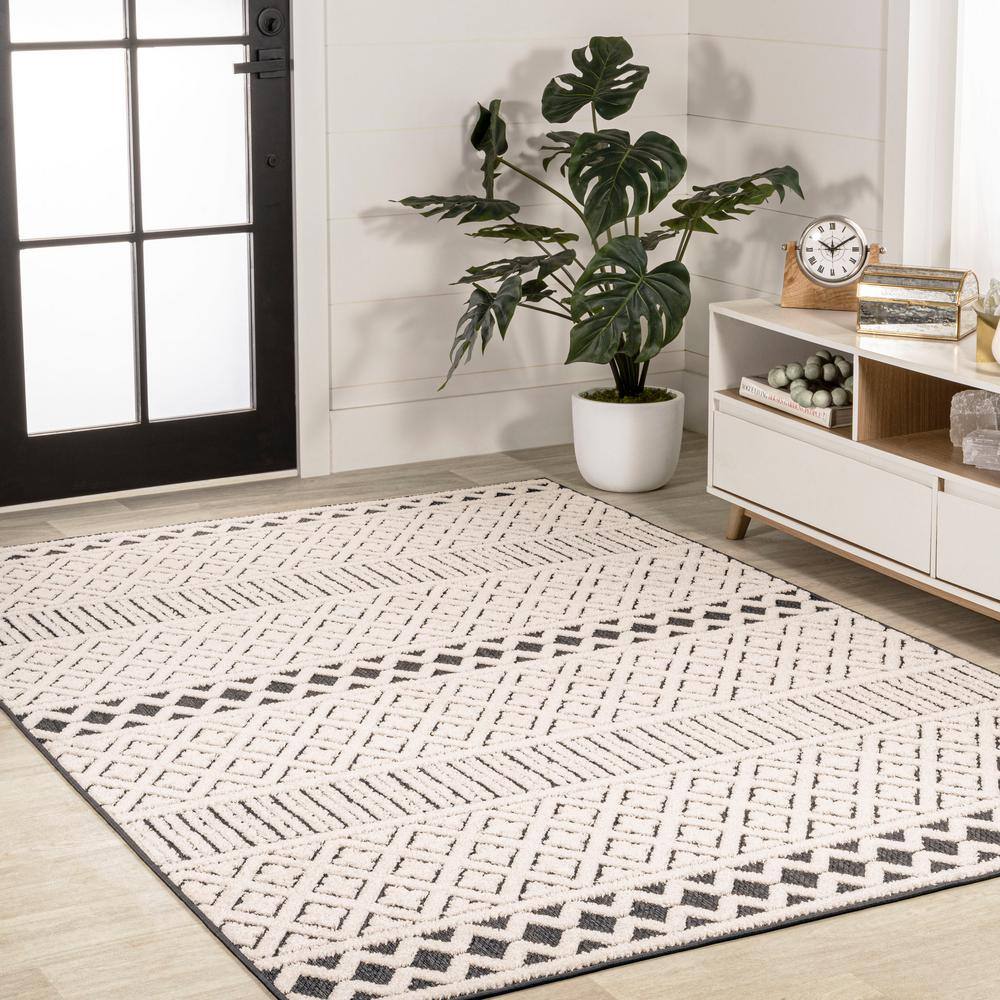 Cream and Black Geometric Synthetic Indoor/Outdoor Area Rug