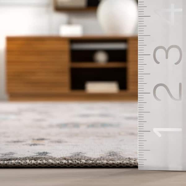Krystin Distressed Machine Washable Area Rug Ivory 5 ft. x 8 ft. Area Rug