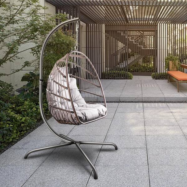 brown rattan garden swing