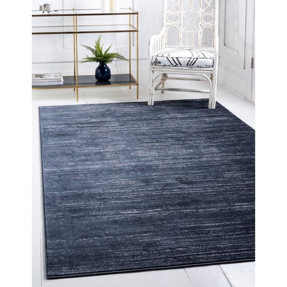 Navy Blue and Ivory 9' x 12' Easy-Care Synthetic Area Rug