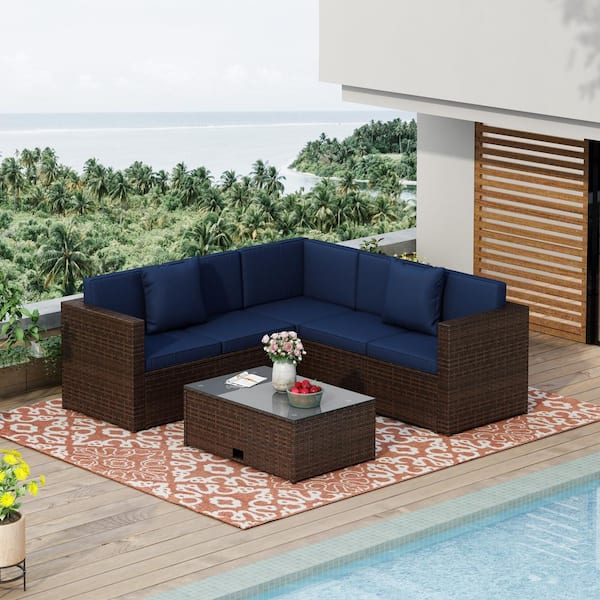 Unbranded Brown Wicker Outdoor Sectional Set with Blue Cushions, 2 Navy Pillows and Coffee Table
