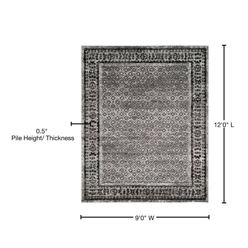 Ivory and Silver Geometric 9' x 12' Synthetic Area Rug