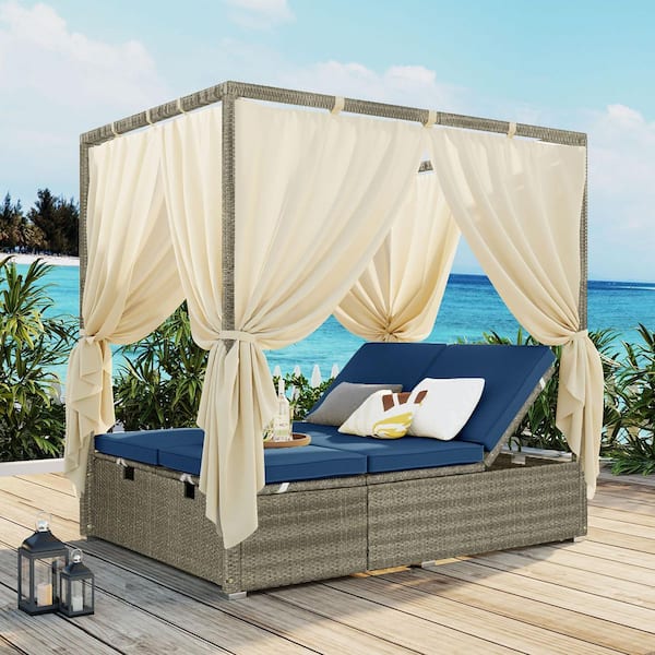 Polibi Wicker Outdoor Day Bed with Blue Cushions and Curtain