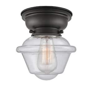 Oxford 7.5 in. 1-Light Matte Black Flush Mount with Seedy Glass Shade