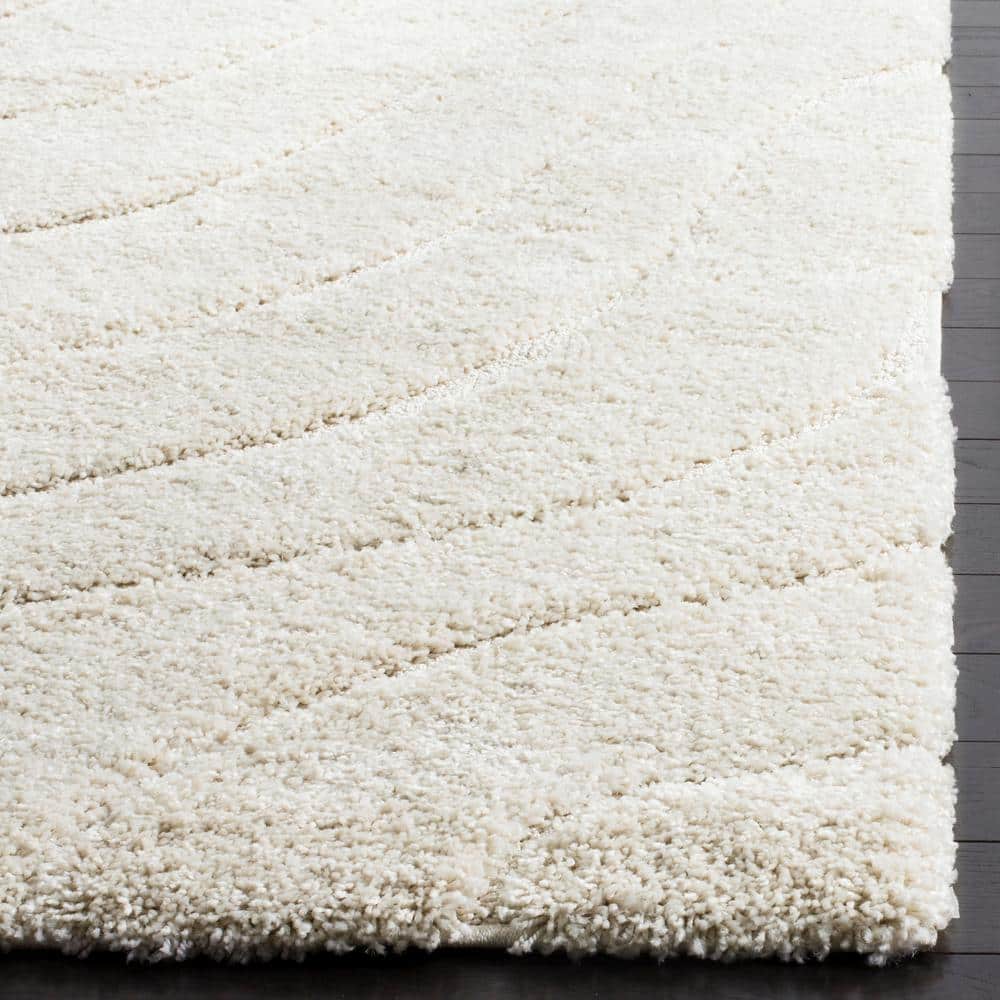 Cream 8' x 10' Synthetic Shag Area Rug
