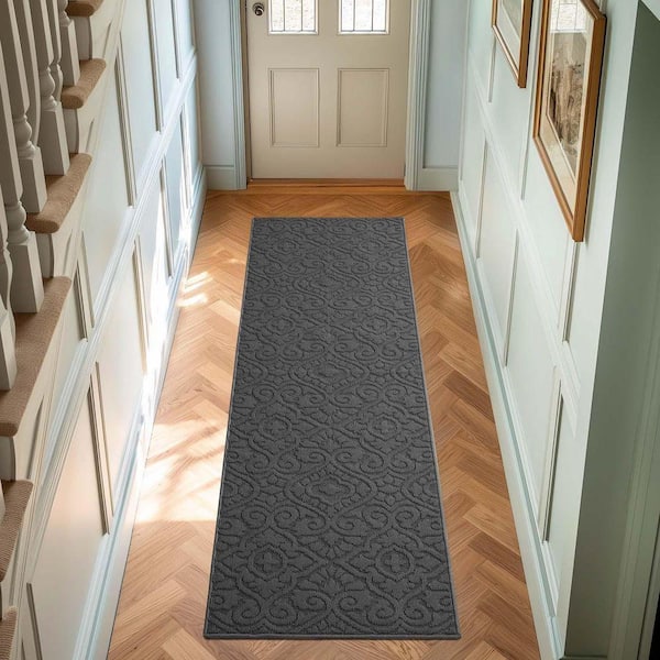 Feya Solid Dark Gray 2 ft. x 6 ft. Tufted Medallion Polypropylene Runner Rug