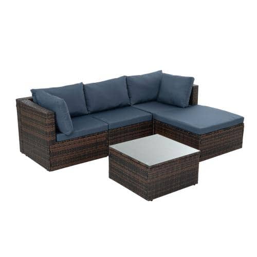 Brown wicker patio furniture set with navy blue cushions on a white background.