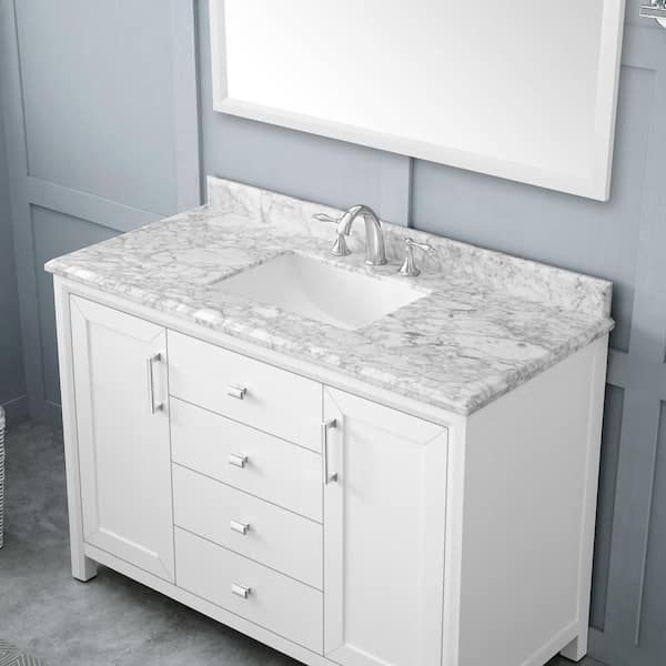 https://images.thdstatic.com/productImages/cb34d3e9-0098-4aec-8bf2-2c36b559ad20/svn/home-decorators-collection-bathroom-vanities-with-tops-rockleigh-48w-a0_600.jpg