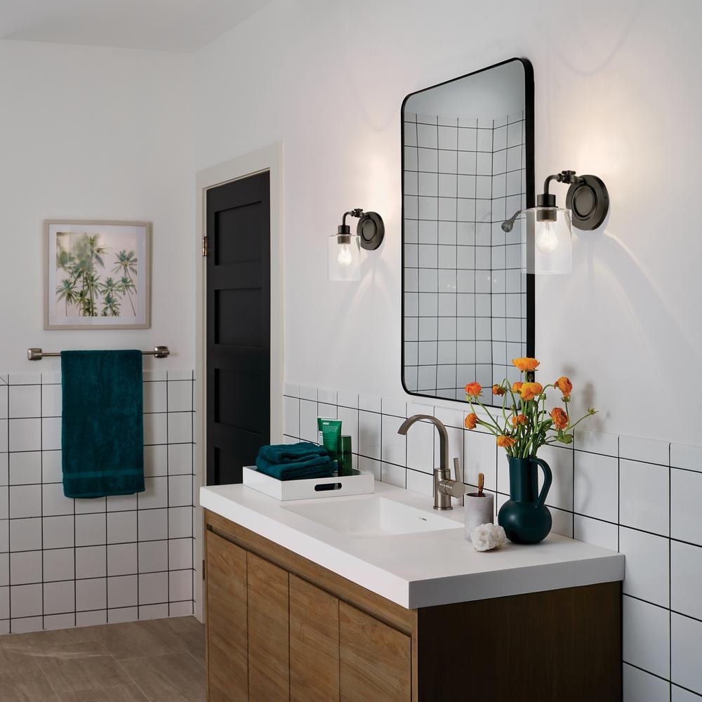 Black Steel Cylinder Wall Sconce with Clear Seeded Glass Shade