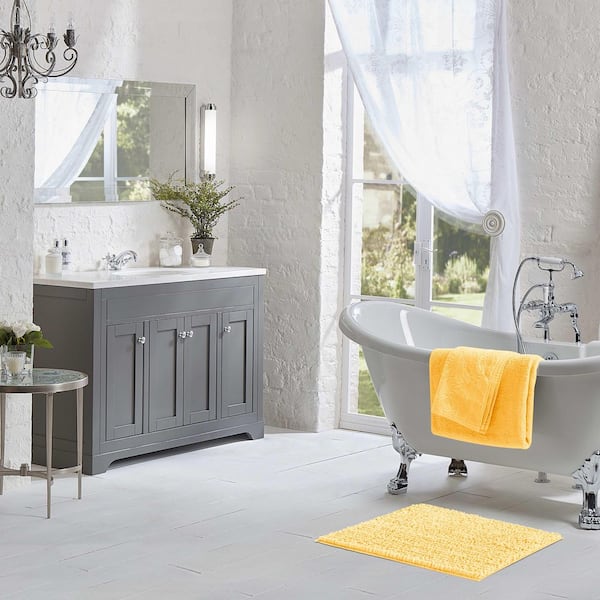 https://images.thdstatic.com/productImages/cb3db0e0-5785-4e2e-b599-d01b157195ab/svn/yellow-laura-ashley-bathroom-rugs-bath-mats-laymb006124-fa_600.jpg