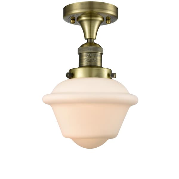 Oxford 7.5 in. 1-Light Antique Brass Traditional Semi-Flush Mount with Frosted Glass Shade